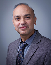 Dr. Adil Alavi